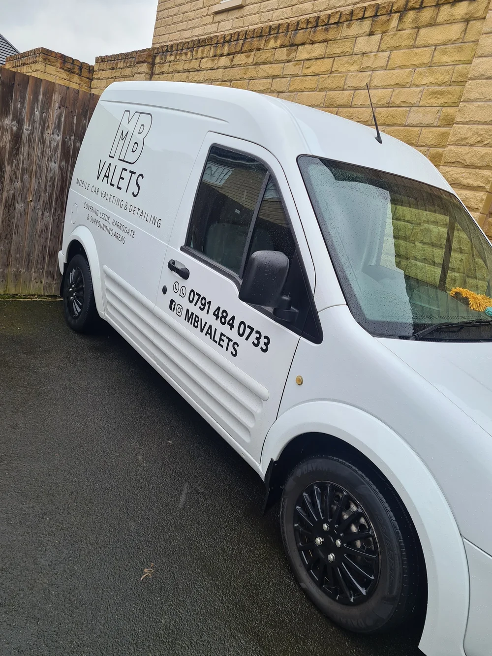 The white MB Valets van with its genuine logo and mobile car valeting lettering